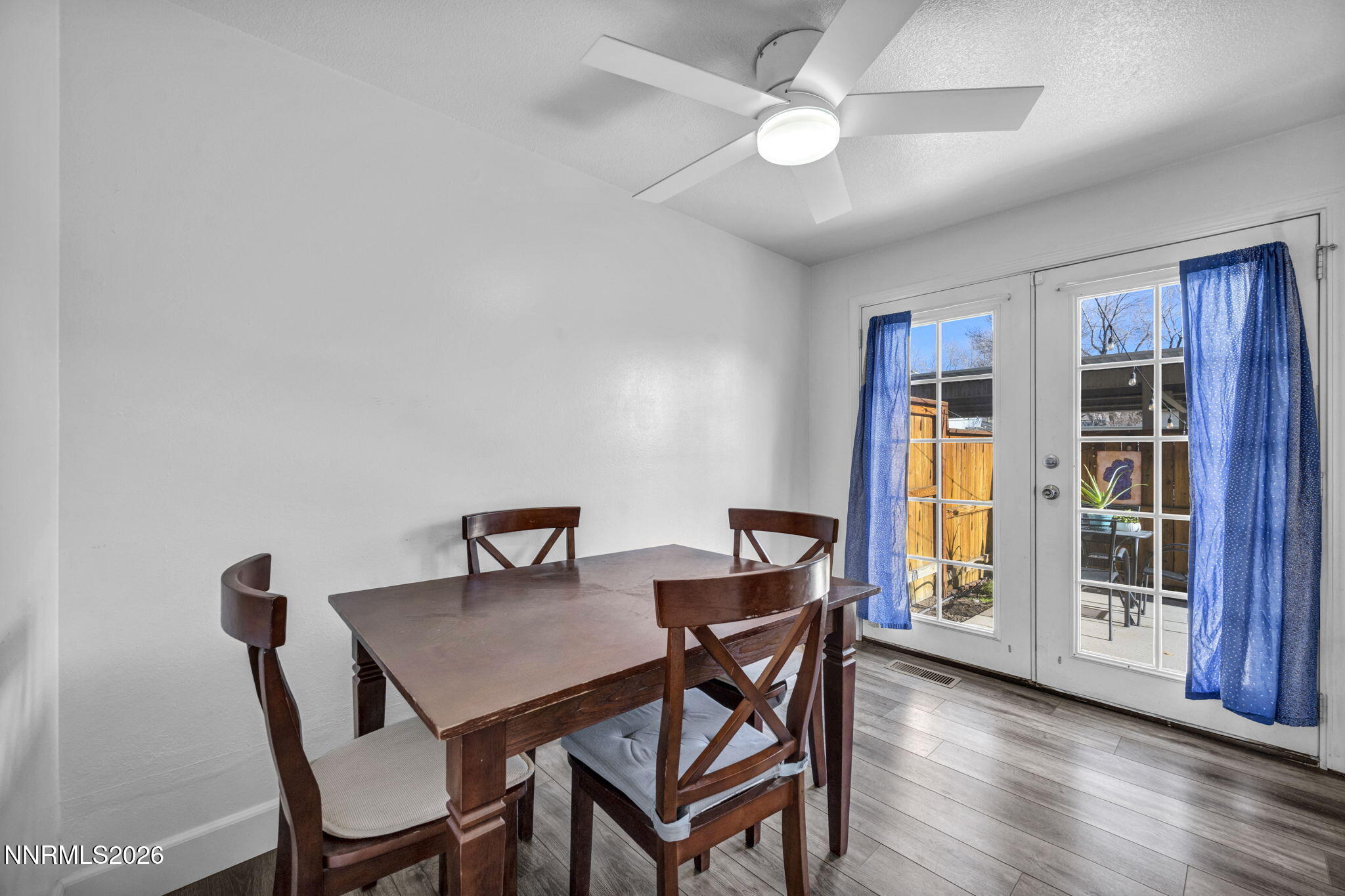 959 Mesa Ridge Drive, Unit 2 Sparks, NV 89434 - Photo 9 of 41 a view of a dining room with furniture and chandelier