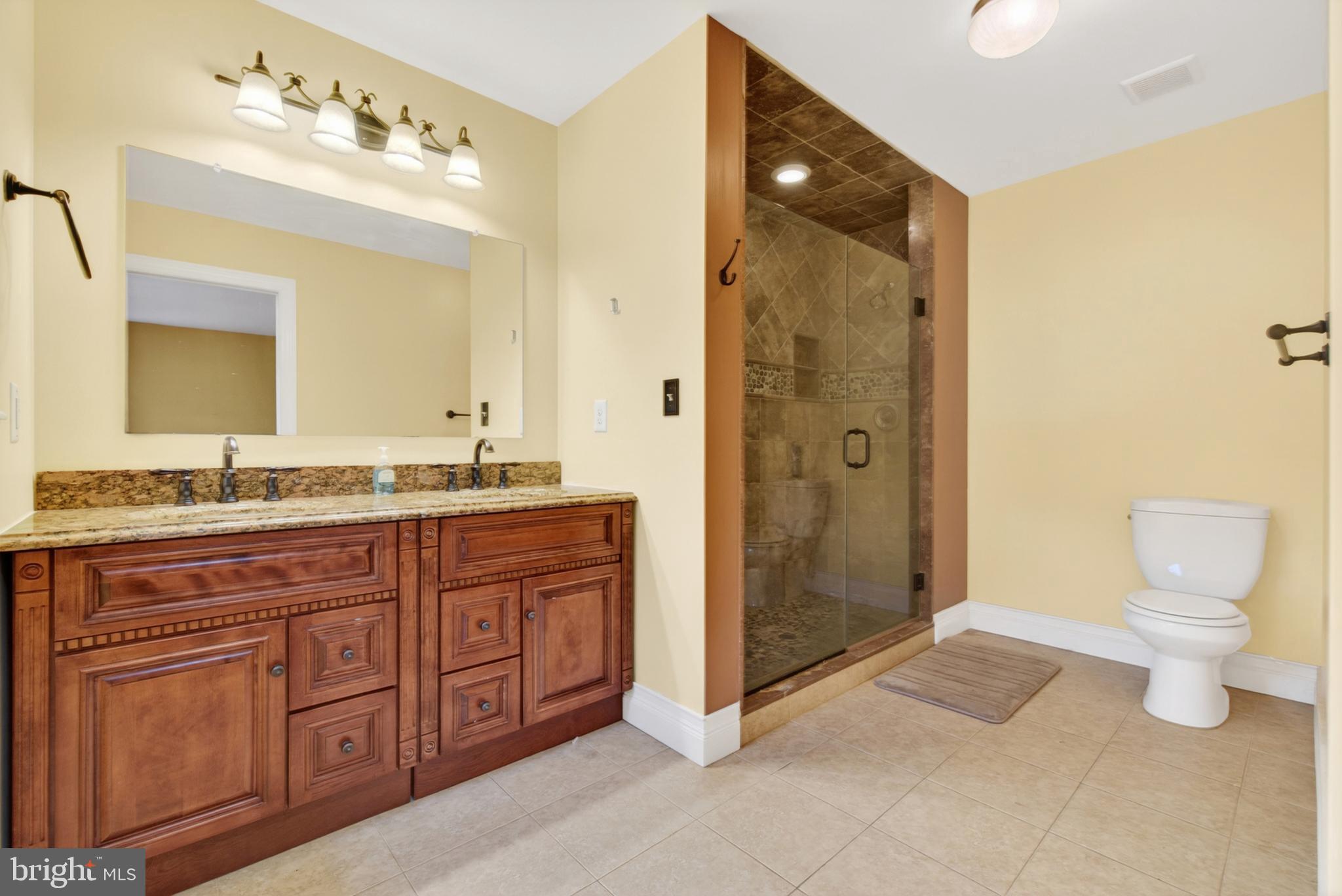 117 State Avenue Lindenwold, NJ 08021 - Photo 42 of 58 a spacious bathroom with a granite countertop sink mirror and shower