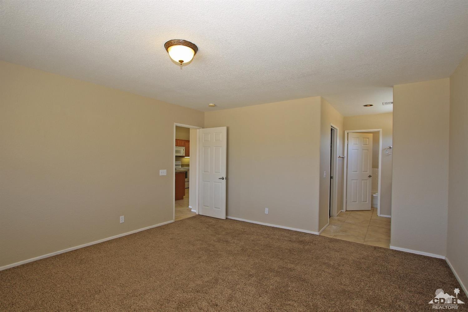 13810 United Road Desert Hot Springs, CA 92240 - Photo 17 of 41 a view of an empty room