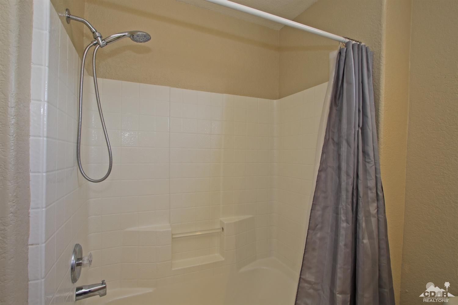 13810 United Road Desert Hot Springs, CA 92240 - Photo 26 of 41 a bathroom with a shower