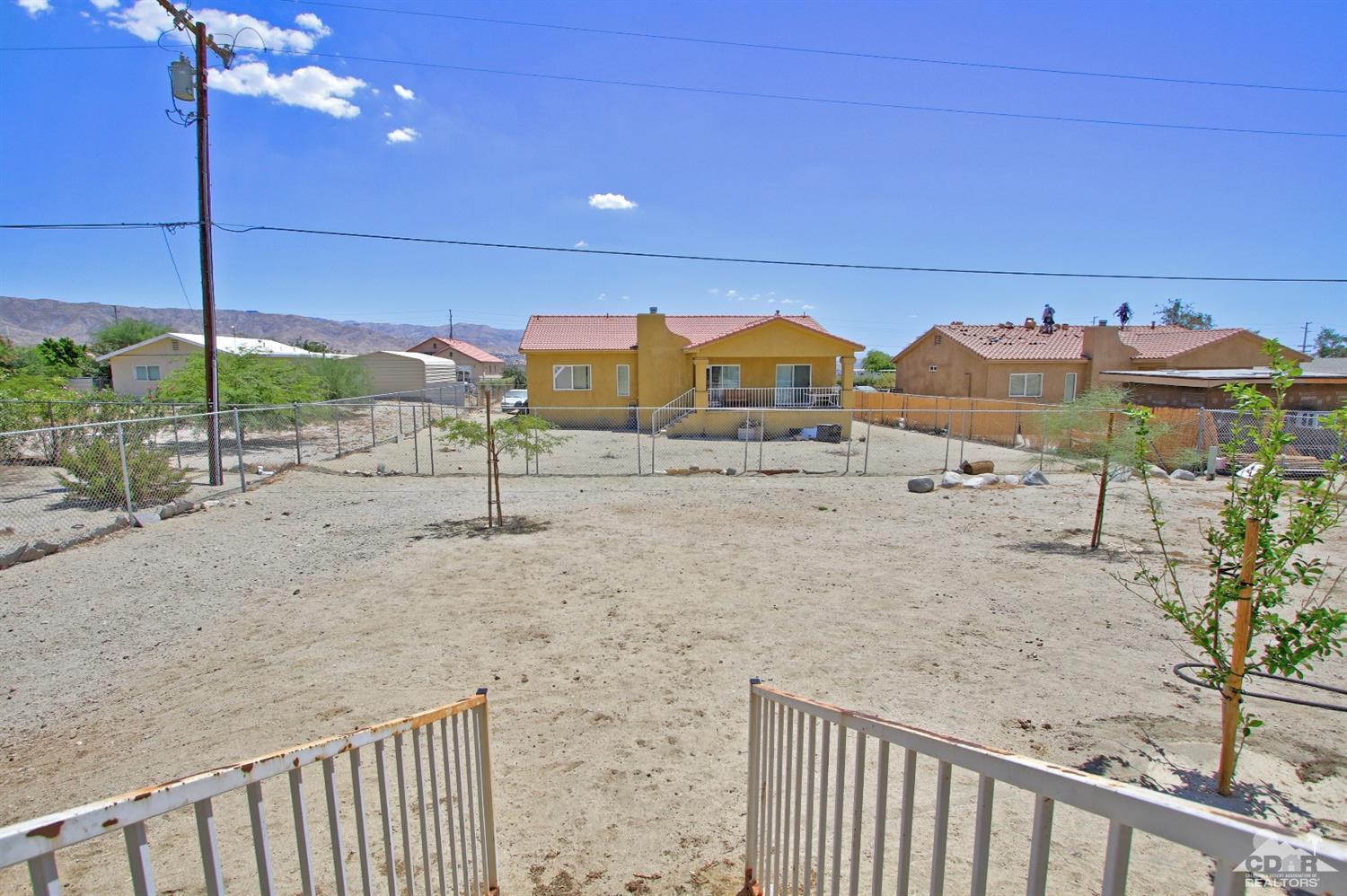 13810 United Road Desert Hot Springs, CA 92240 - Photo 30 of 41 a view of a terrace with a yard