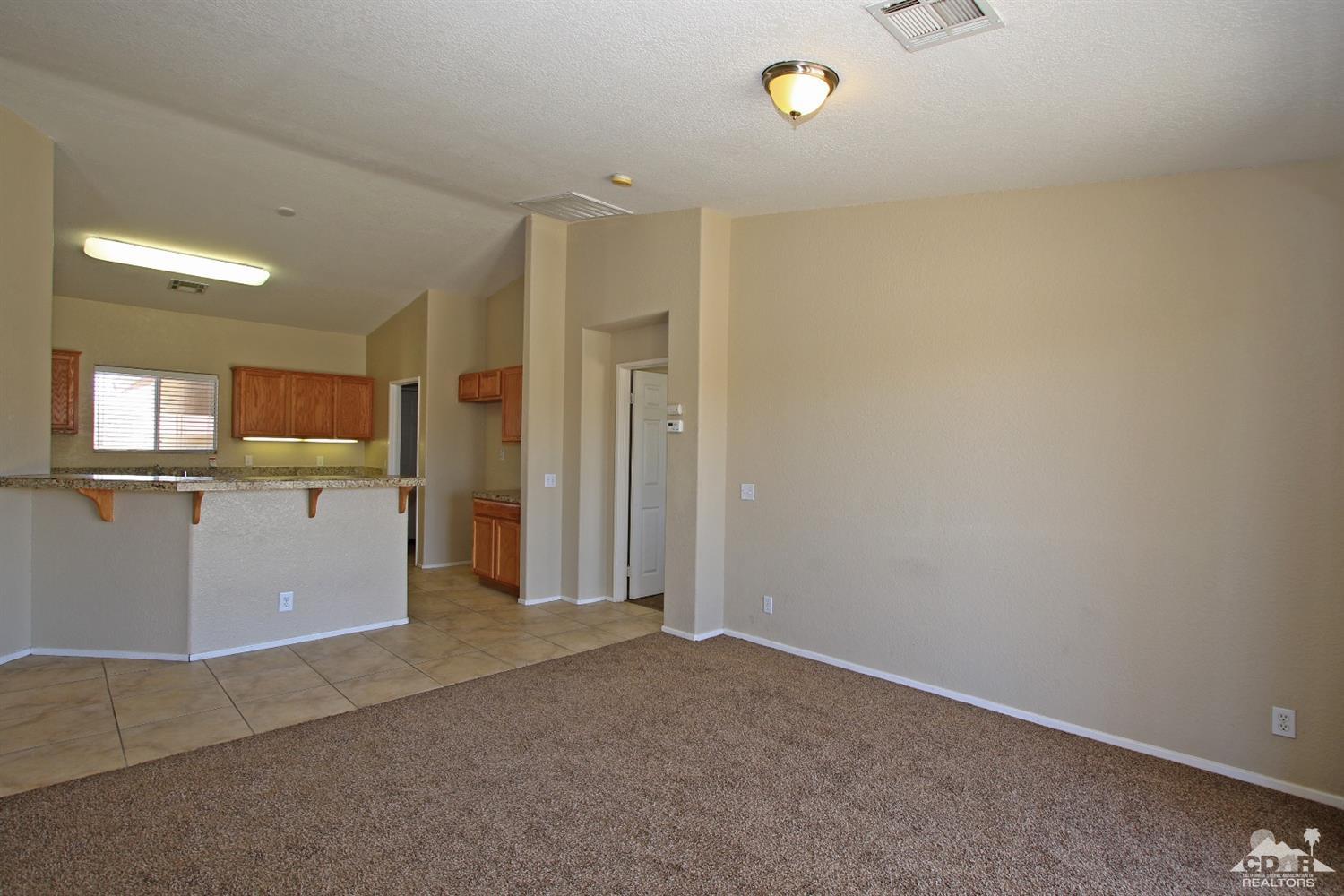 13810 United Road Desert Hot Springs, CA 92240 - Photo 5 of 41 a view of a kitchen with a sink