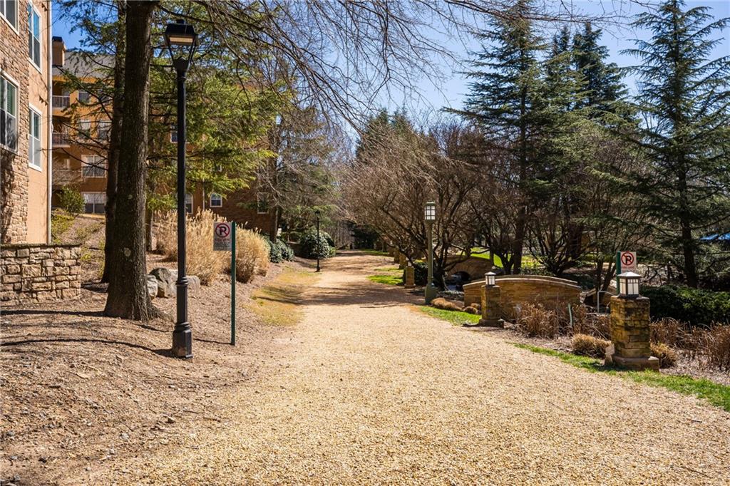 10 Perimeter Summit Boulevard, Unit 1404 Brookhaven, GA 30319 - Photo 21 of 39 a street view covered with snow