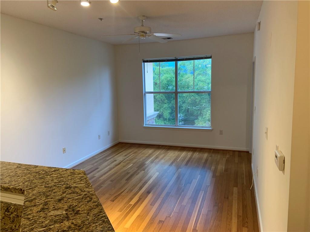10 Perimeter Summit Boulevard, Unit 1404 Brookhaven, GA 30319 - Photo 10 of 39 a view of an empty room and window