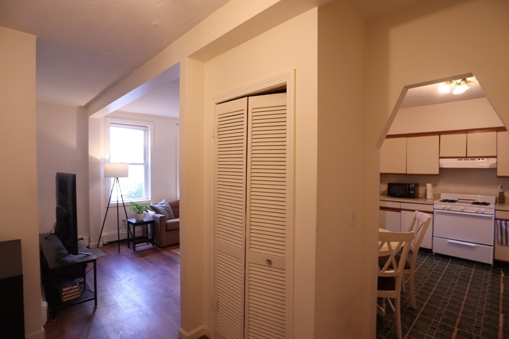 7 Saybrook Street, Unit 17 Boston, MA 02135 - Photo 15 of 30 a view of a livingroom with workspace and a window