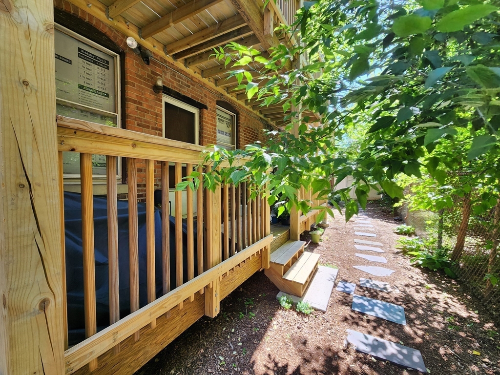 7 Saybrook Street, Unit 17 Boston, MA 02135 - Photo 20 of 30 a stairs of a house with a yard