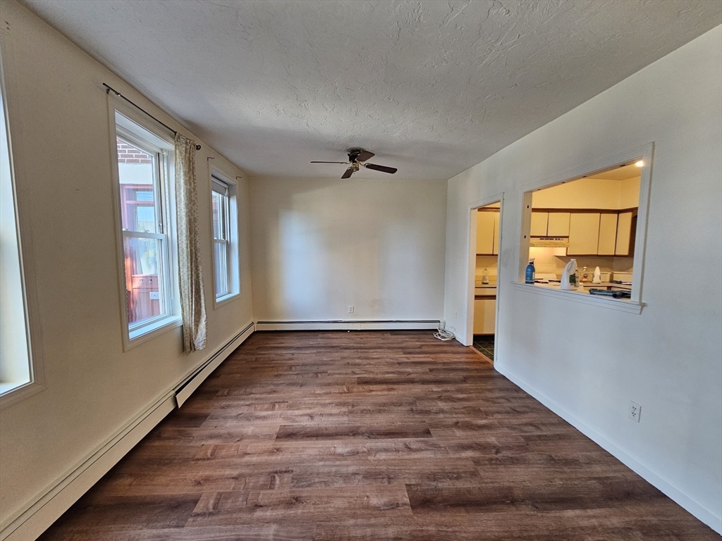 7 Saybrook Street, Unit 17 Boston, MA 02135 - Photo 3 of 30 a view of an empty room and window