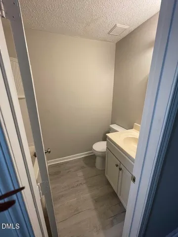 a bathroom with a sink and toilet