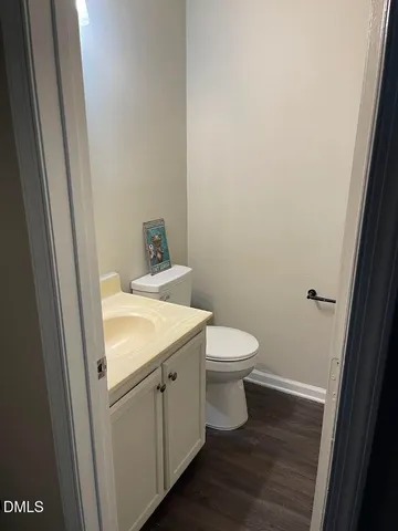 a bathroom with a toilet and a sink