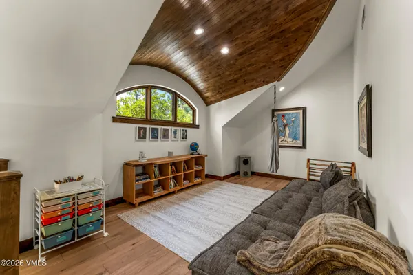 a living room with furniture and a window
