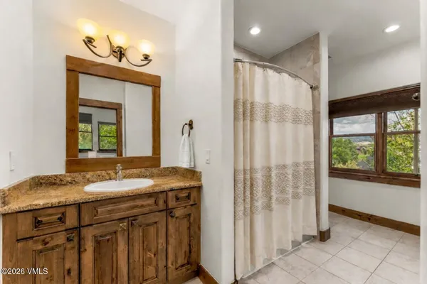 a living room with a couch and a flat screen tv