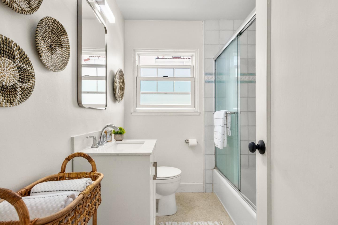 337 Hillcrest Drive Aptos, CA 95003 - Photo 11 of 31 a bathroom with a toilet a sink and mirror