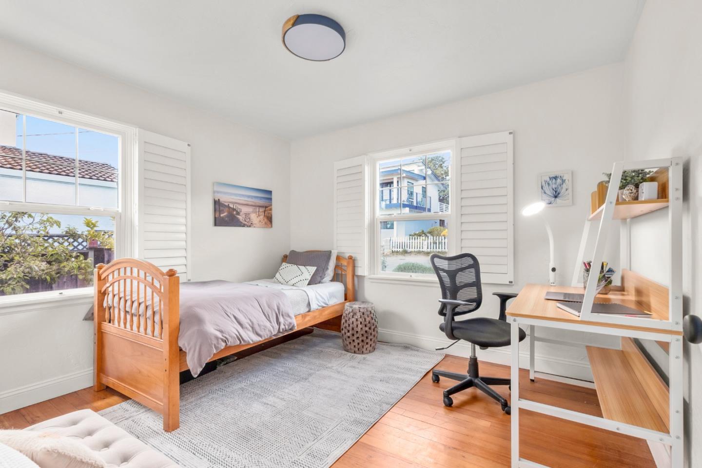 337 Hillcrest Drive Aptos, CA 95003 - Photo 12 of 31 a living room with a bed furniture and a window