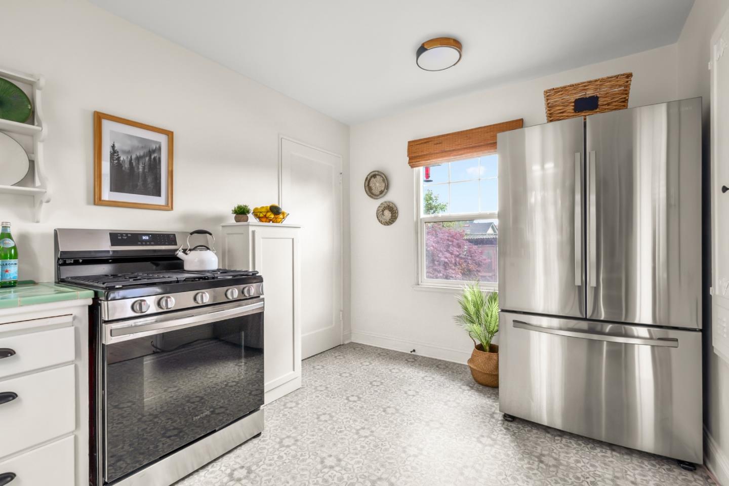 337 Hillcrest Drive Aptos, CA 95003 - Photo 17 of 31 a kitchen with stainless steel appliances a stove a refrigerator and cabinets