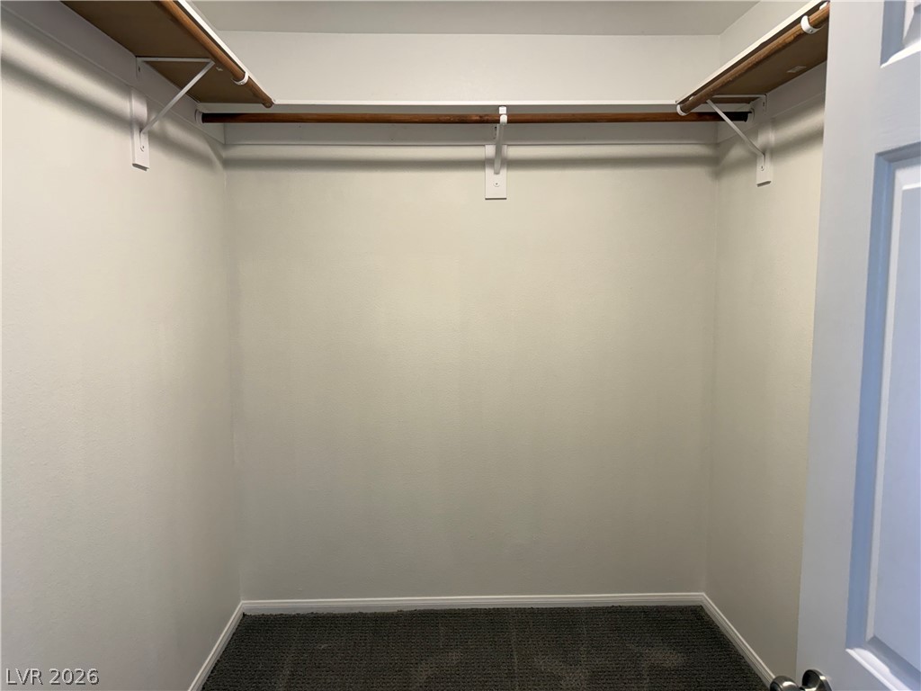 1141 Cathedral Ridge Street Henderson, NV 89052 - Photo 50 of 77 This ample closet space offers organized storage solutions for your wardrobe needs.