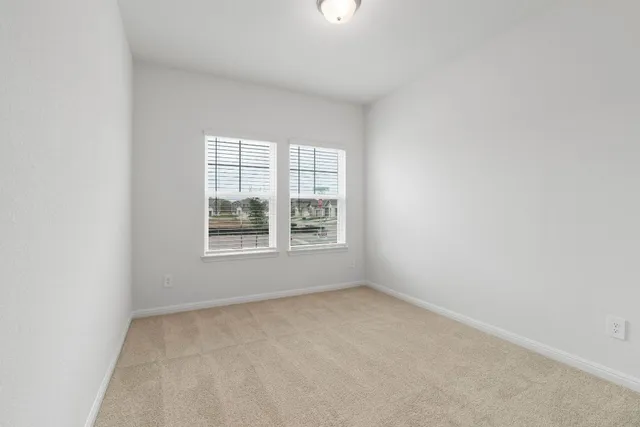 a bathroom with a double vanity sink and mirror