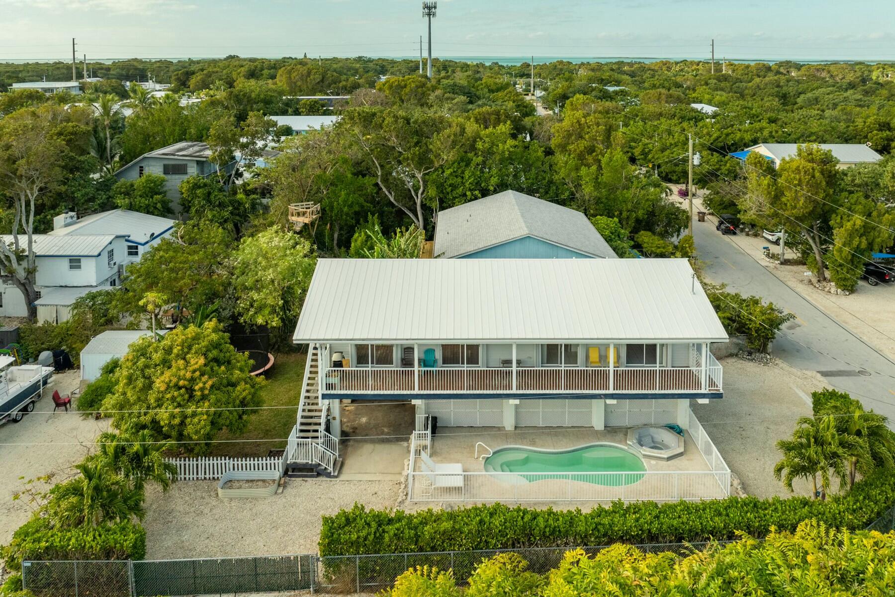 1010 Snapper Lane Key Largo, FL 33037 - Photo 3 of 26 an aerial view of a house