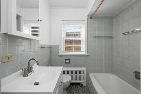 a bathroom with a sink and a bathtub