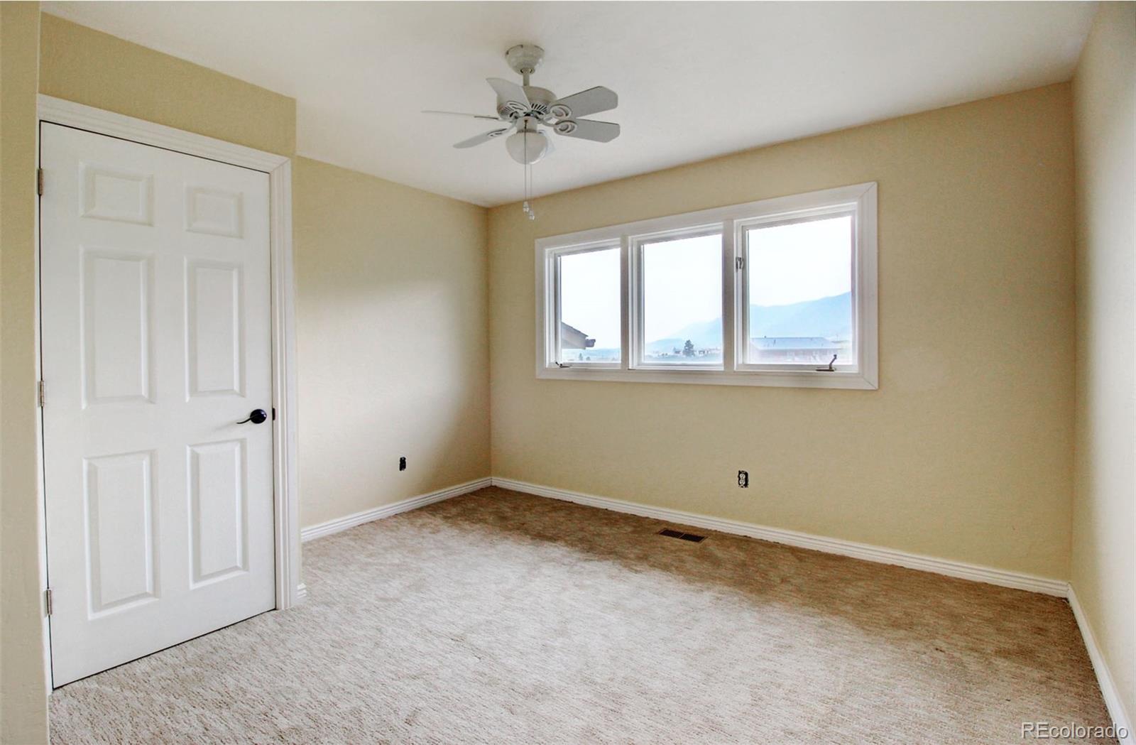 4345 Evans Road Monument, CO 80132 - Photo 28 of 40 a view of an empty room with a window