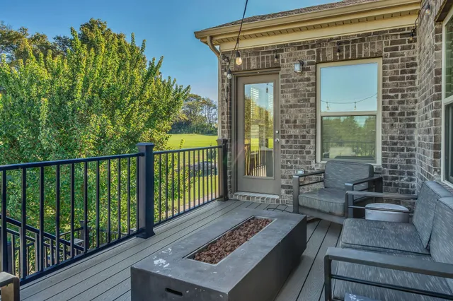 a bathroom with a sink mirror and vanity