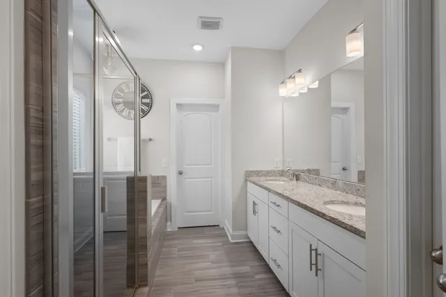 a view of a golf course with a lake