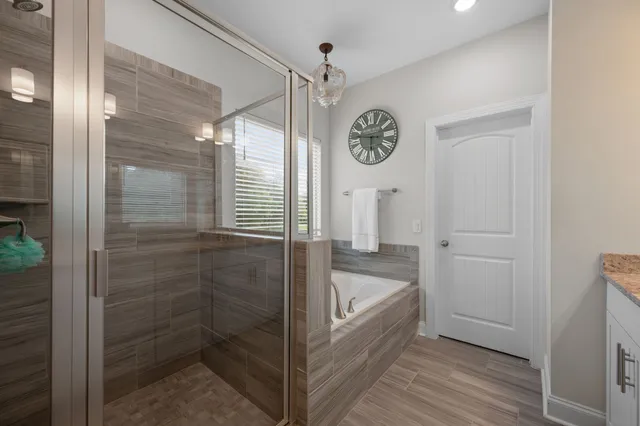 a view of a golf course with a lake view