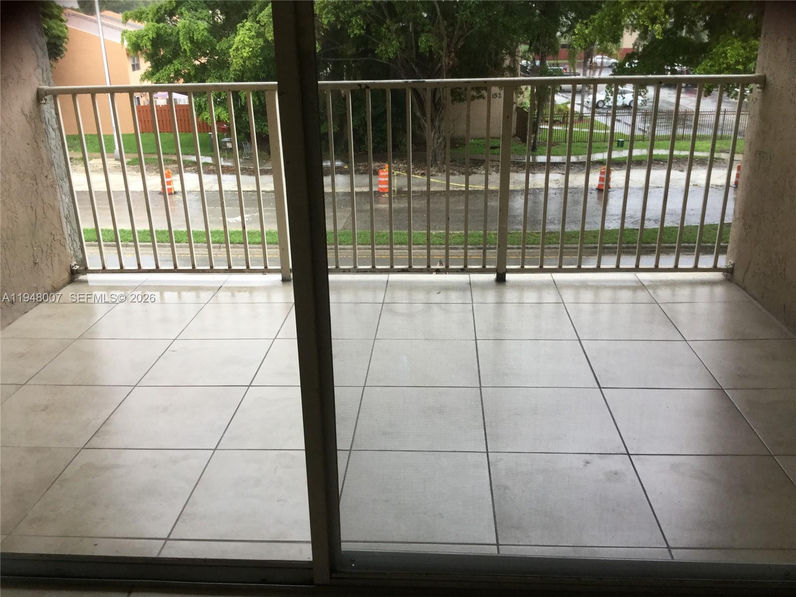 15241 Southwest 80th Street, Unit 307 Miami, FL 33193 - Photo 4 of 11 a view of a gate