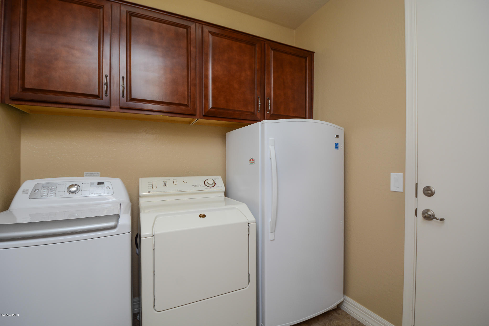 7545 West Redbird Road Peoria, AZ 85383 - Photo 14 of 23 a utility room with dryer and washer