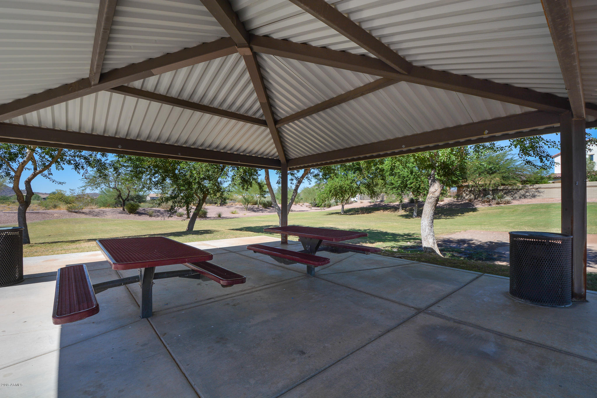 7545 West Redbird Road Peoria, AZ 85383 - Photo 22 of 23 an outdoor sitting area with couch and umbrella