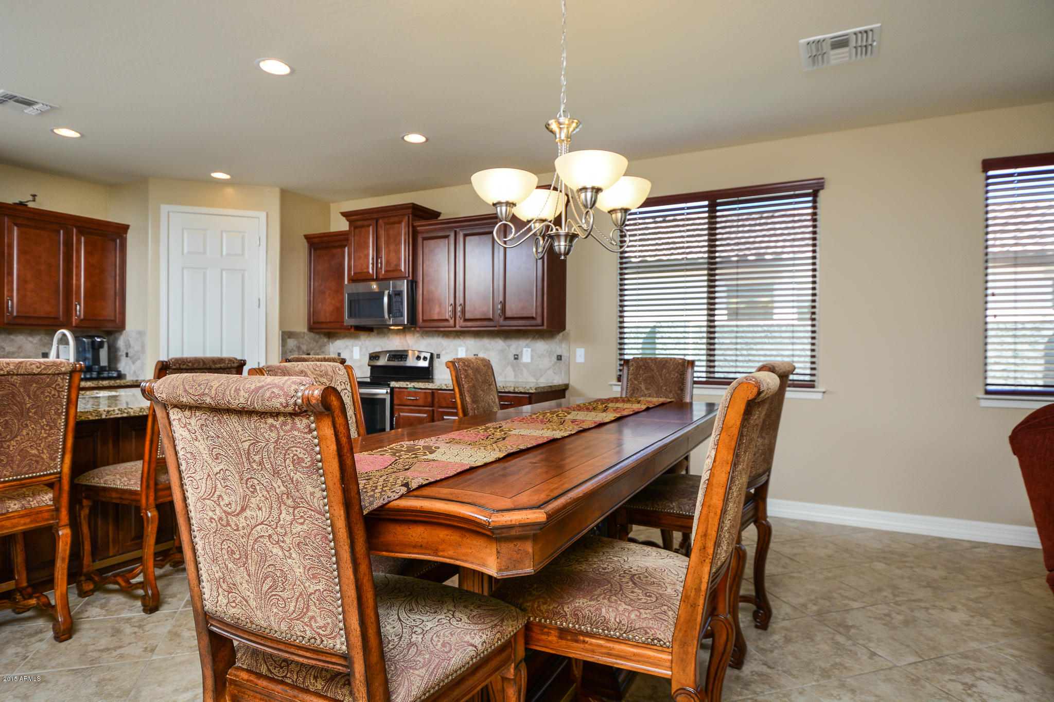 7545 West Redbird Road Peoria, AZ 85383 - Photo 6 of 23 a view of a dining room with furniture