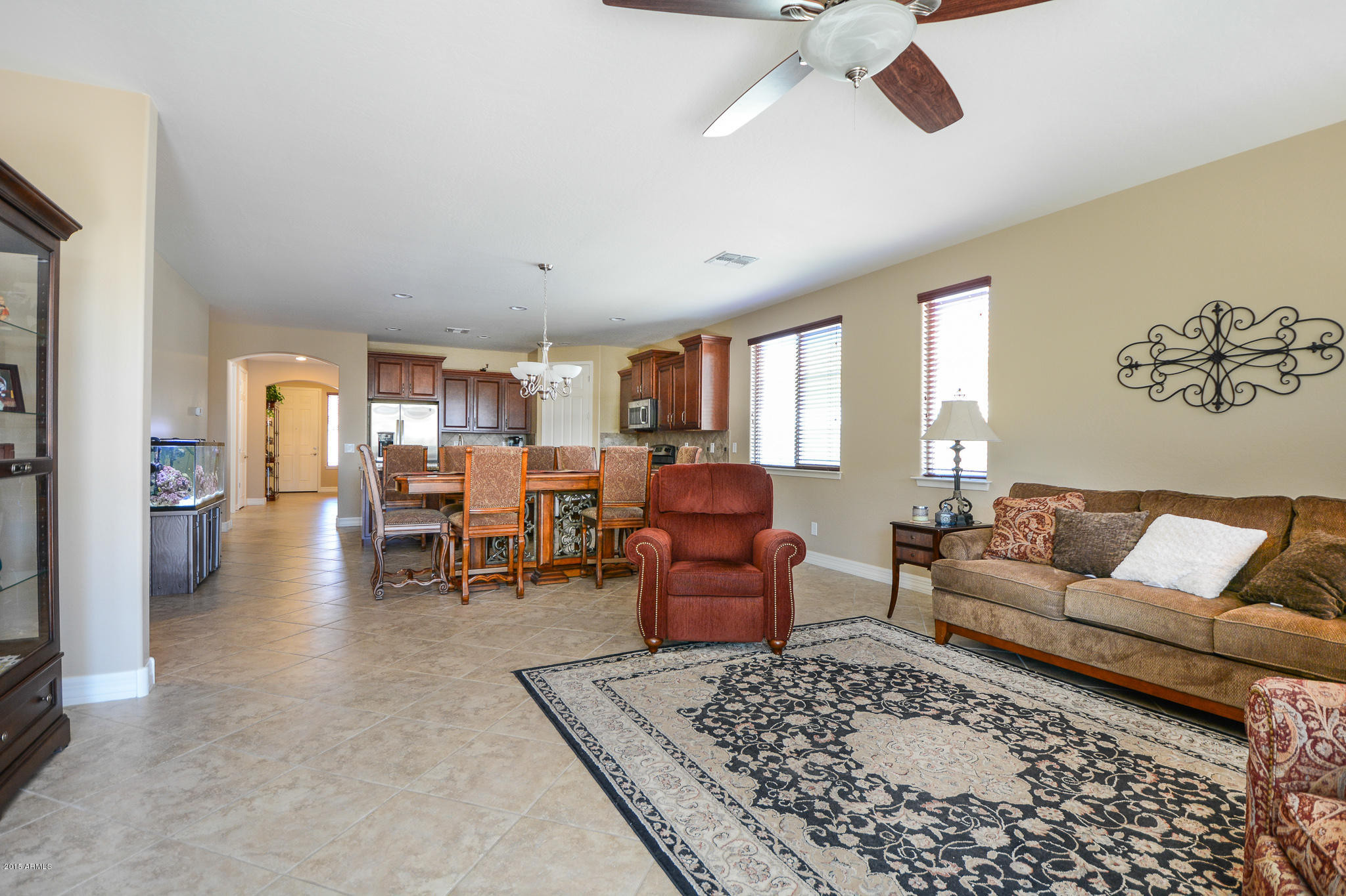 7545 West Redbird Road Peoria, AZ 85383 - Photo 9 of 23 a living room with furniture and wooden floor