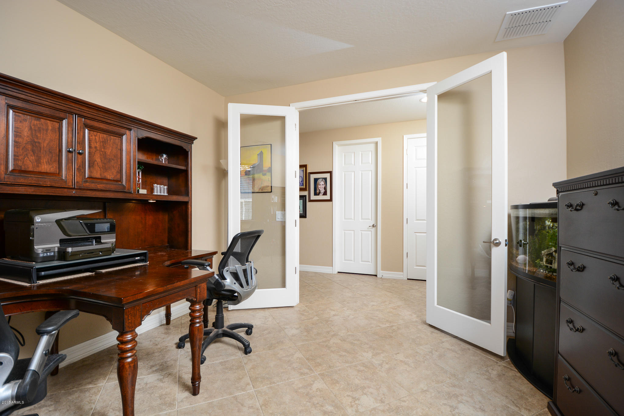 7545 West Redbird Road Peoria, AZ 85383 - Photo 10 of 23 a view of a workspace with furniture