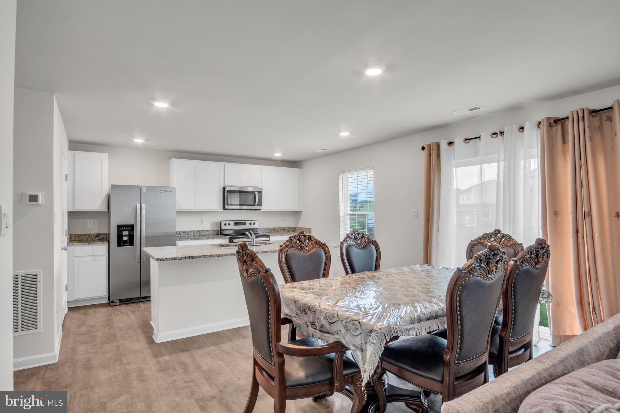 18 Smokehouse Road Carlisle, PA 17013 - Photo 7 of 33 a view of a dining room with furniture