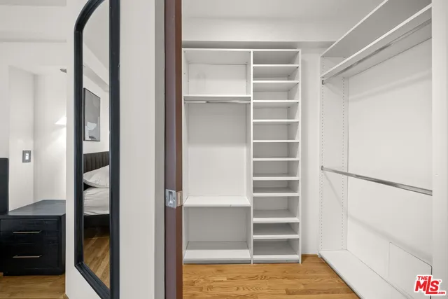 a large bathroom with a large tub and sink