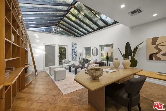 a bathroom with a granite countertop sink a toilet and bathtub