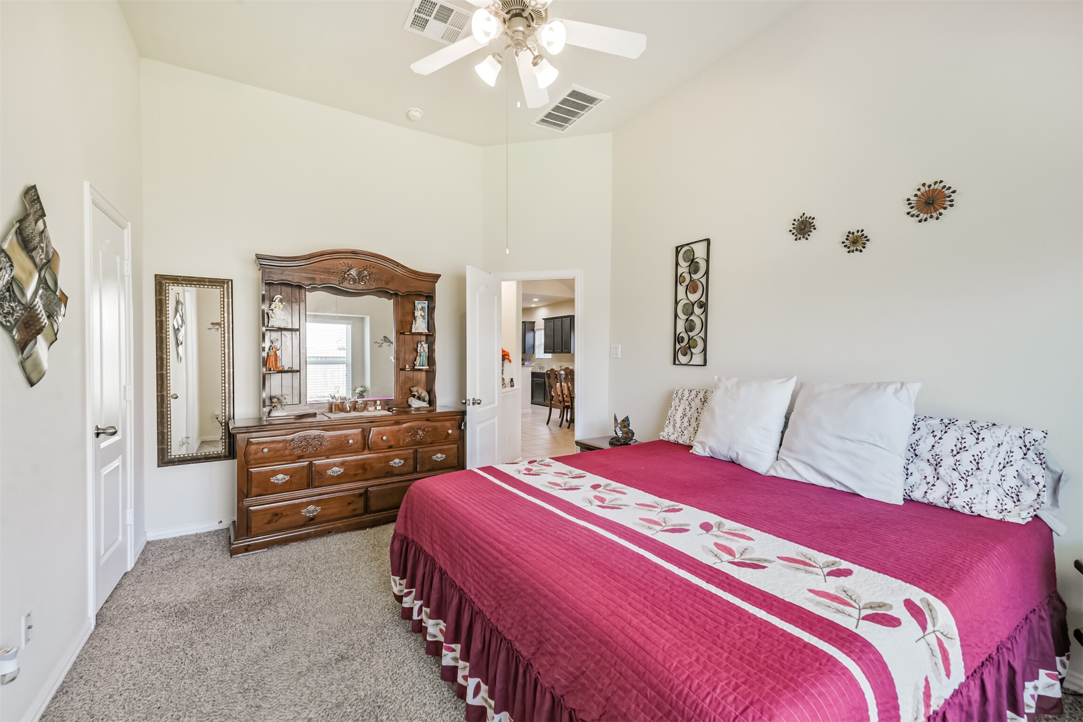 7527 Windsor Valley Lane Houston, TX 77049 - Photo 22 of 35 a bedroom with a bed dresser and window