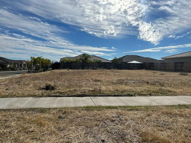 a view of a road with an ocean