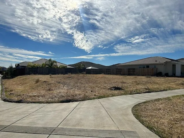 a view of a street with a houses