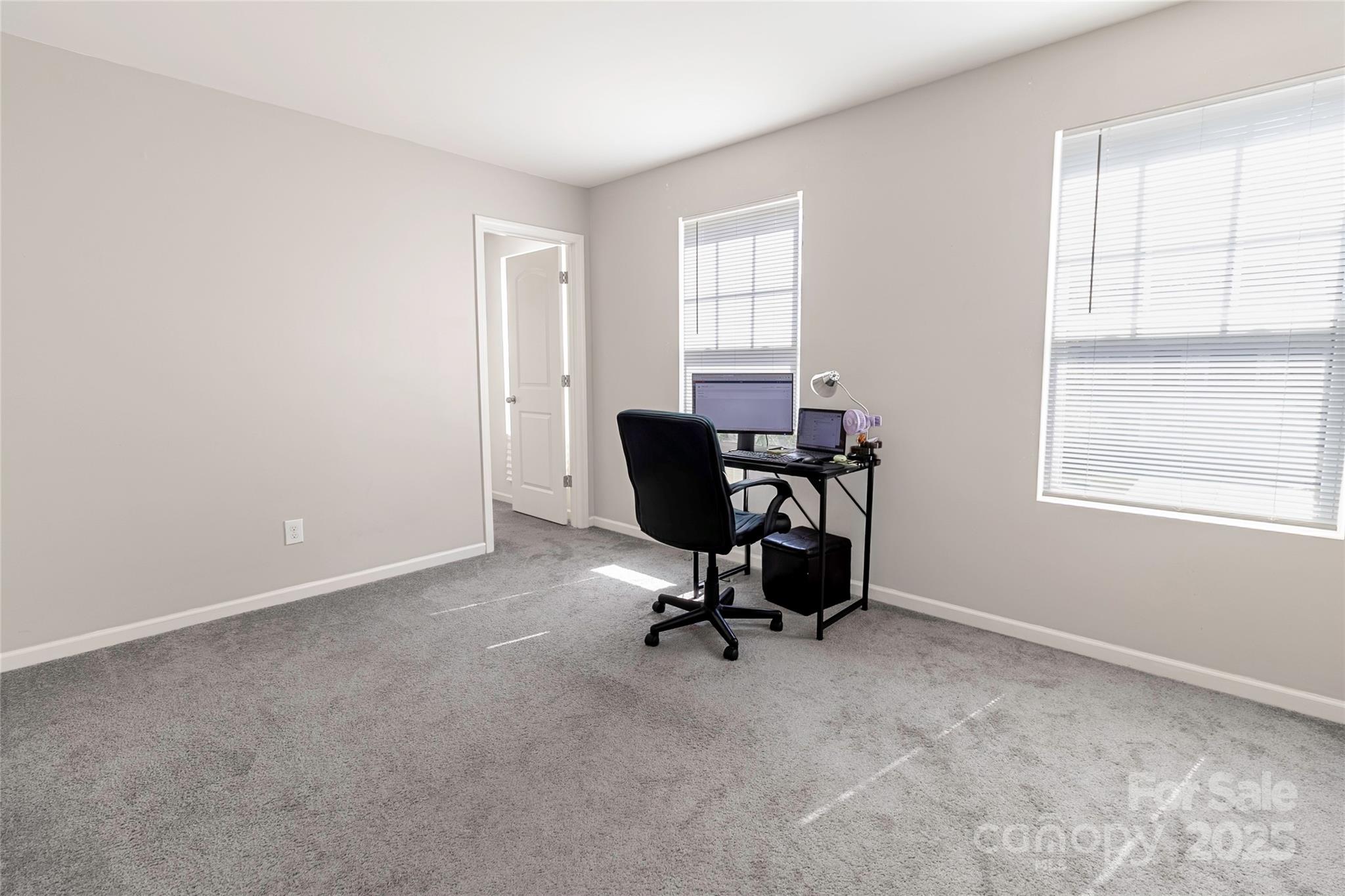 7017 Whitewater Loop Lowell, NC 28098 - Photo 16 of 24 a view of a workspace with a window