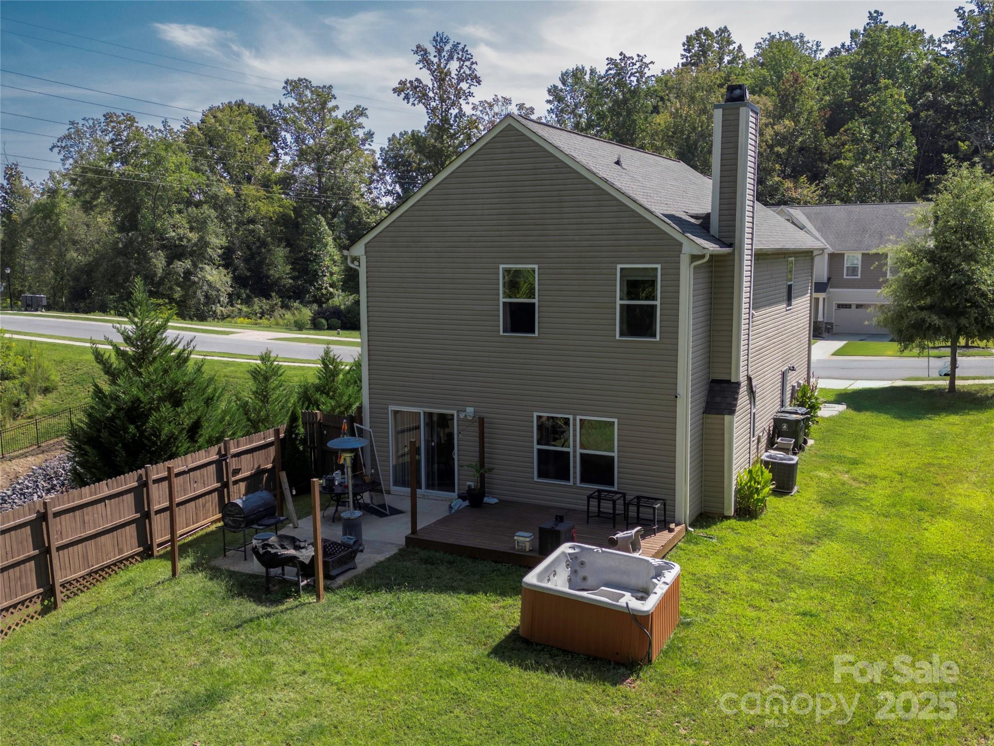 7017 Whitewater Loop Lowell, NC 28098 - Photo 22 of 24 a front view of a house with garden