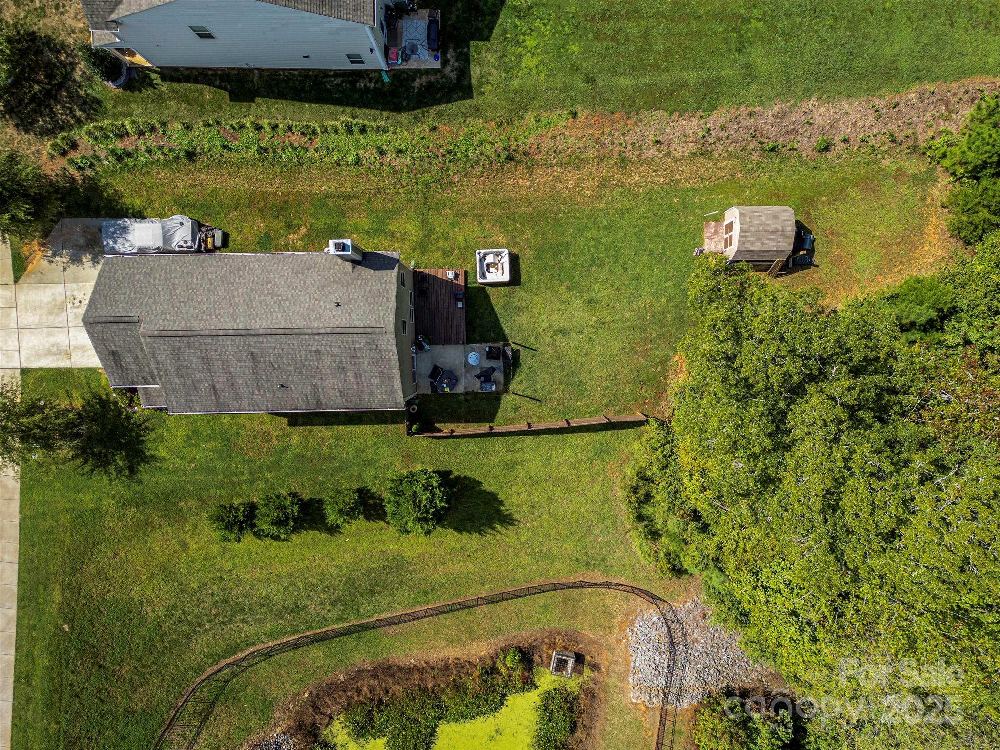 7017 Whitewater Loop Lowell, NC 28098 - Photo 24 of 24 an aerial view of a residential houses with outdoor space