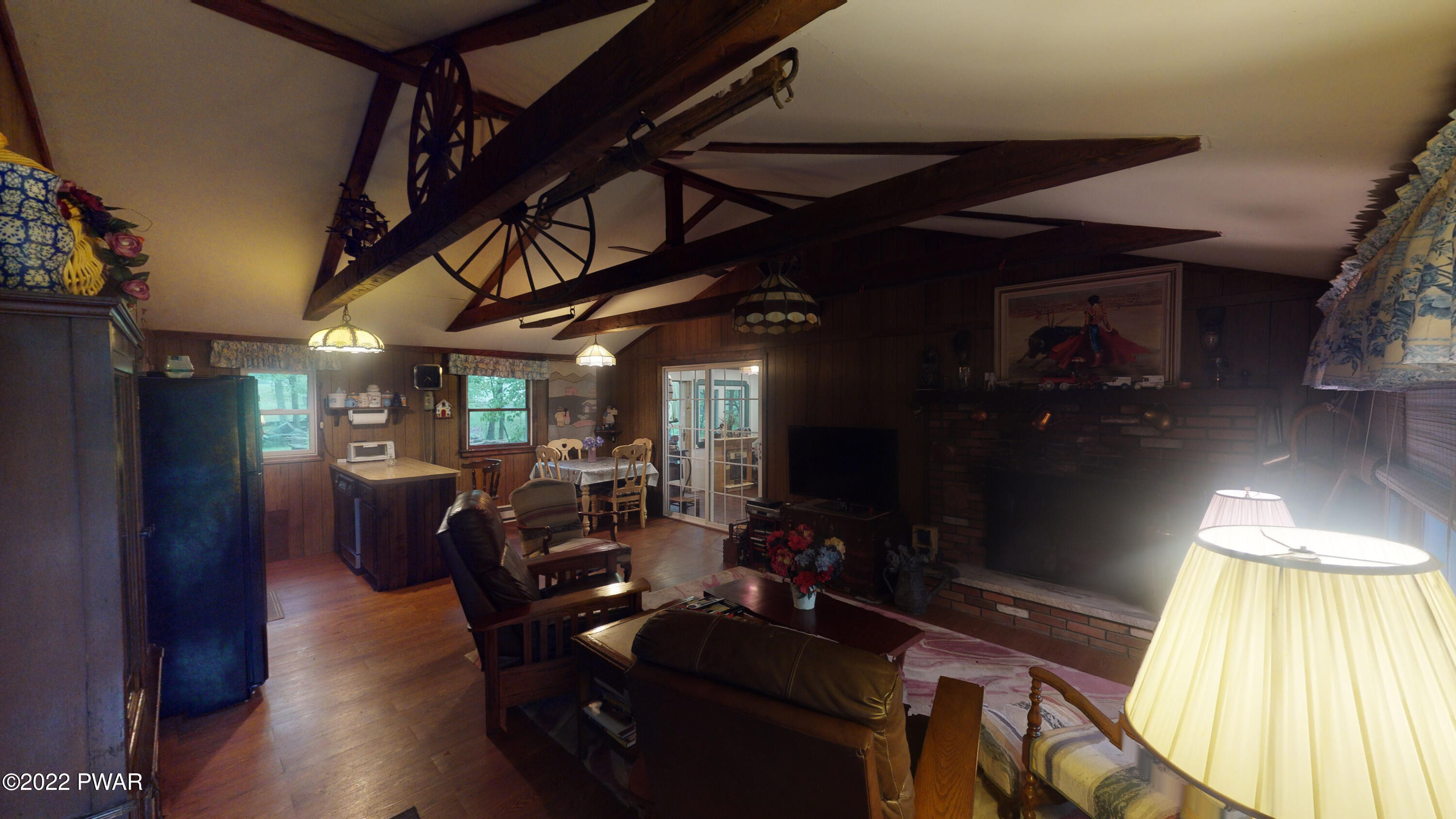 137 Stamford Road Dingmans Ferry, PA 18328 - Photo 18 of 31 a view of a livingroom with furniture and a window