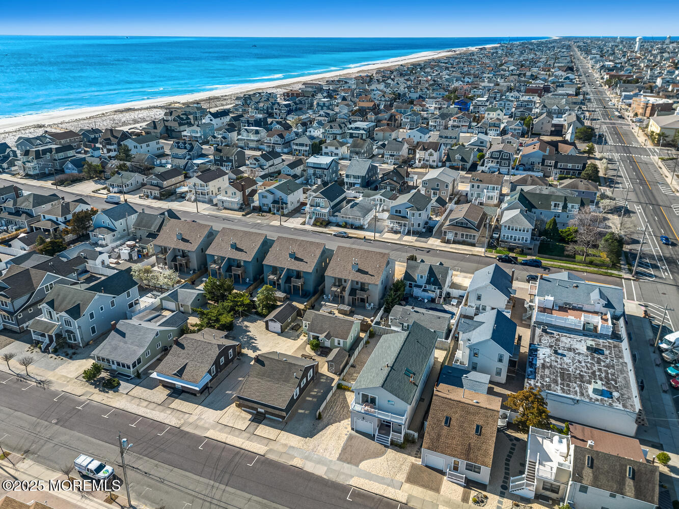 21 Brown Avenue, Unit 1 Lavallette, NJ 08735 - Photo 20 of 28 an aerial view of a building with ocean view