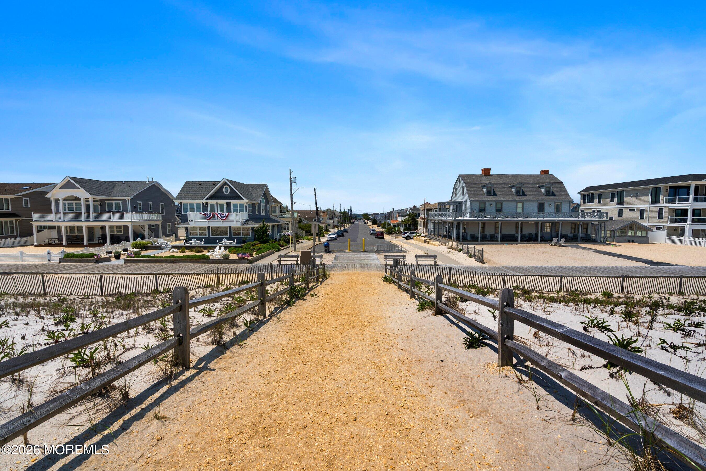 21 Brown Avenue, Unit 1 Lavallette, NJ 08735 - Photo 27 of 28 a view of a city with tall buildings