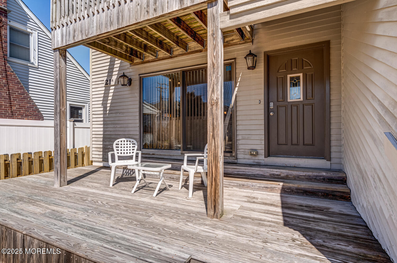 21 Brown Avenue, Unit 1 Lavallette, NJ 08735 - Photo 3 of 28 a porch with seating space