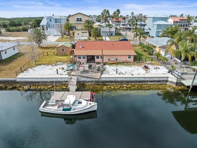 a view of a city with lawn chairs