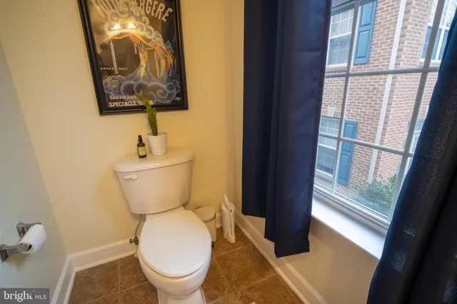 a bathroom with a toilet and a sink