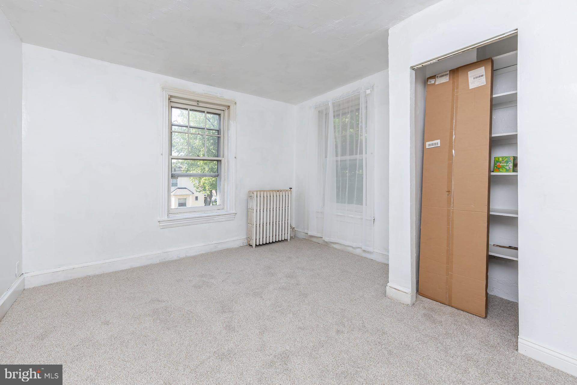 401 West Avenue Delanco, NJ 08075 - Photo 16 of 19 an empty room with windows and closet