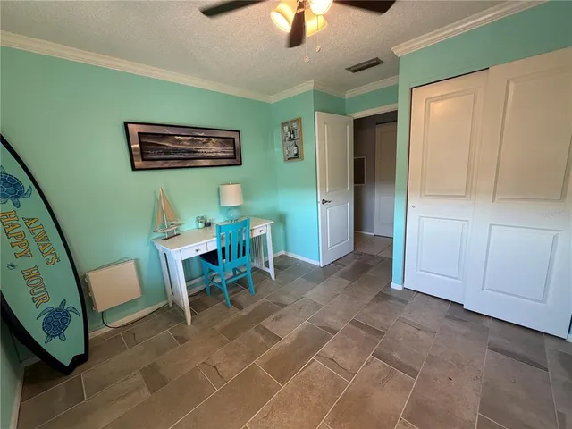 a view of a livingroom with furniture and a furniture