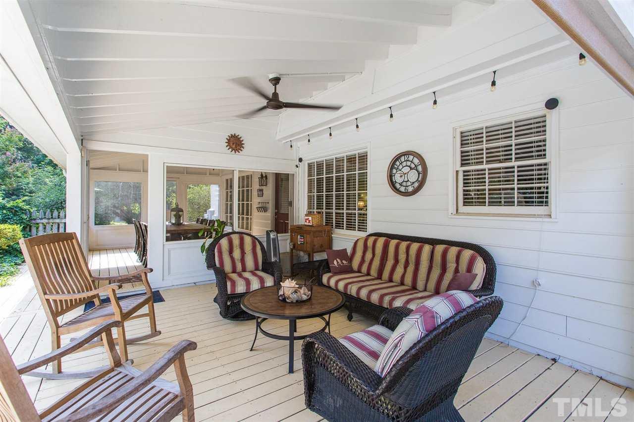 4300 Pike Road Raleigh, NC 27613 - Photo 7 of 28 a living room with furniture ceiling fan and a rug